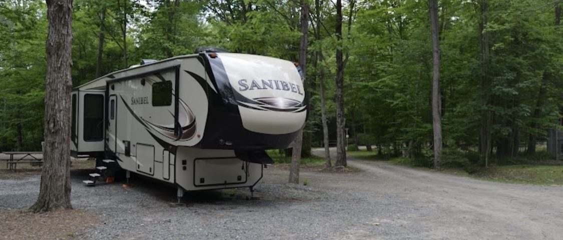 Peaceful campsite at Canyon Country Campground in Wellsboro PA surrounded by trees