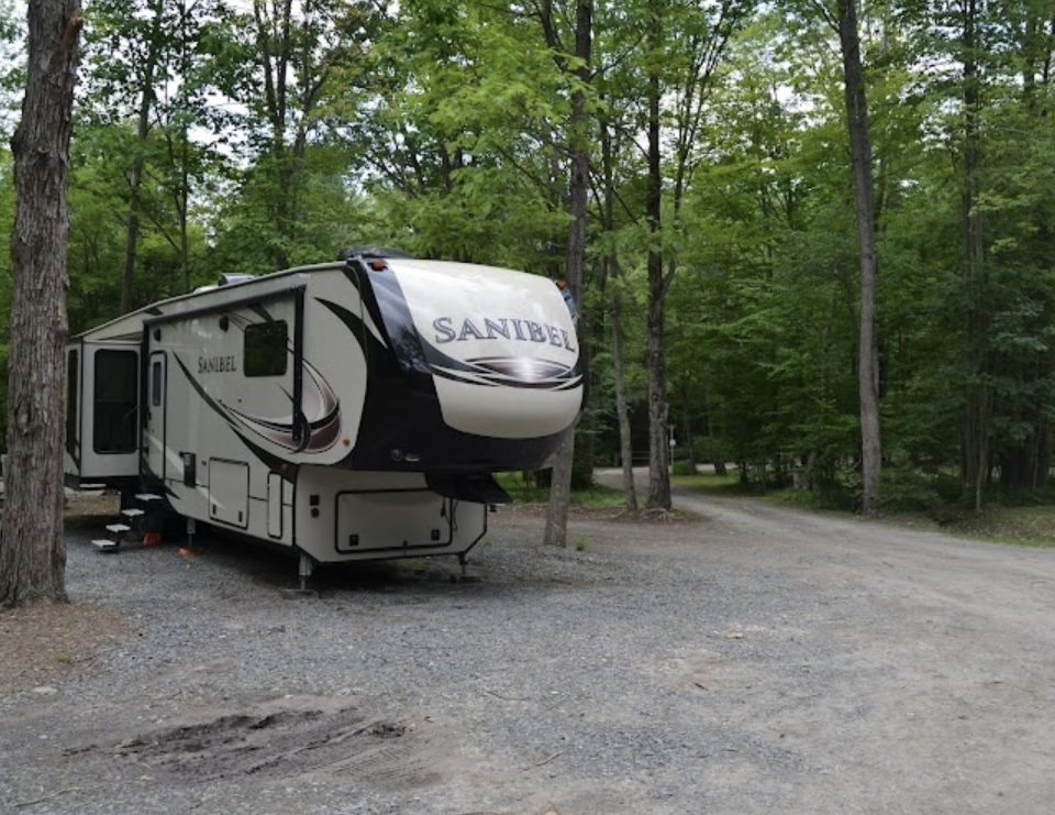 Peaceful campsite at Canyon Country Campground in Wellsboro PA surrounded by trees