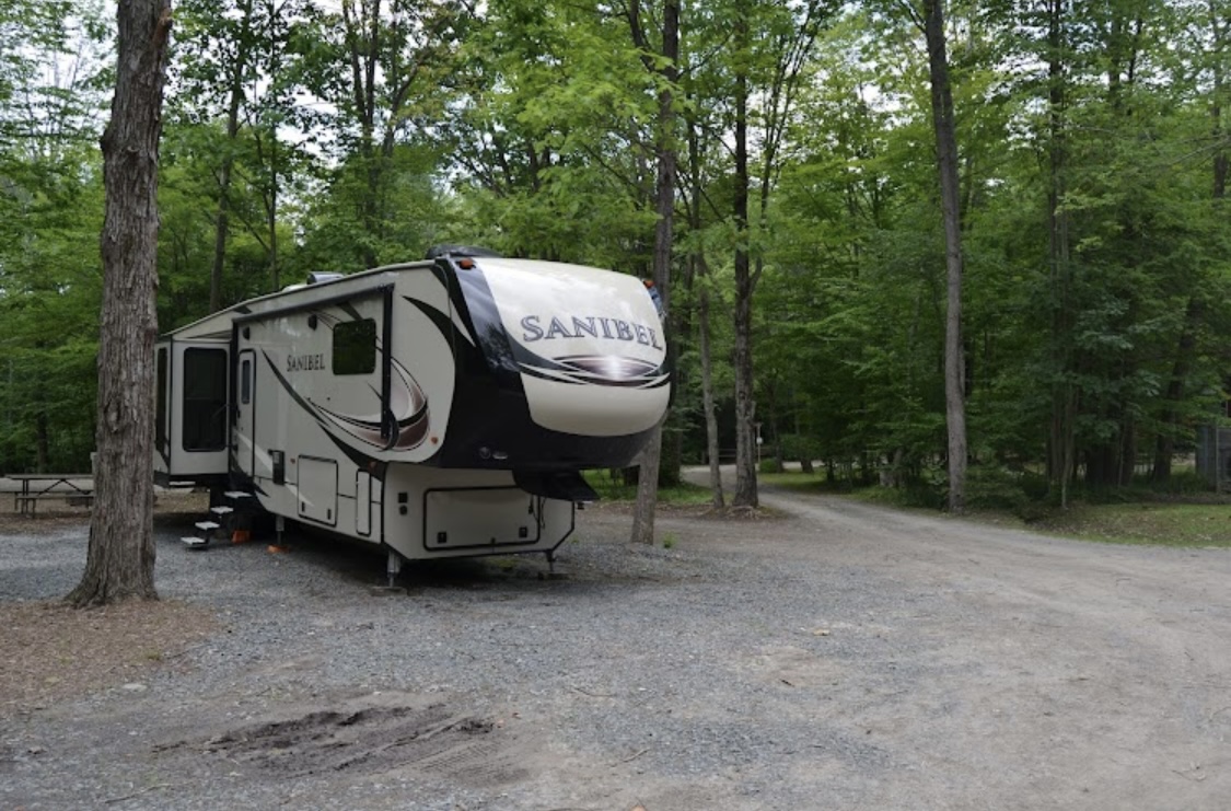 Peaceful campsite at Canyon Country Campground in Wellsboro PA surrounded by trees