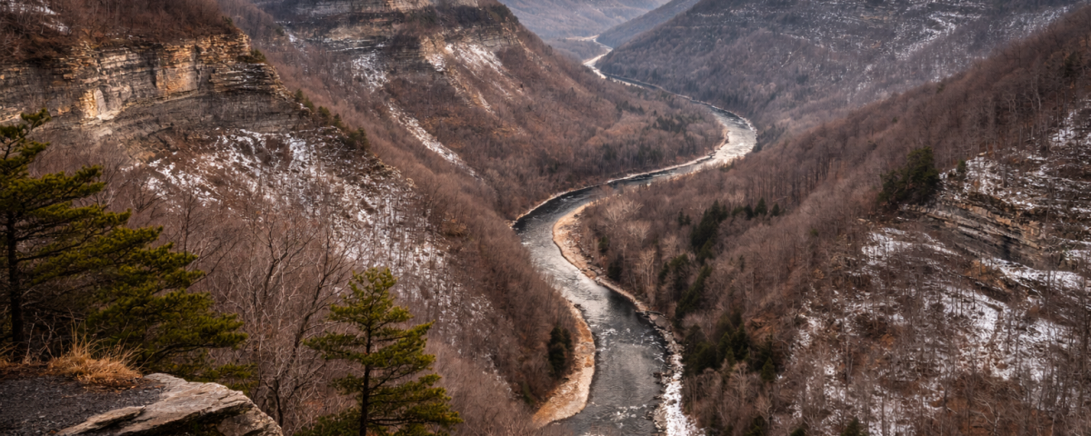 Scenic view of Pine Creek Gorge with layered ridges and winding creek showing the landscape of the Pennsylvania Grand Canyon